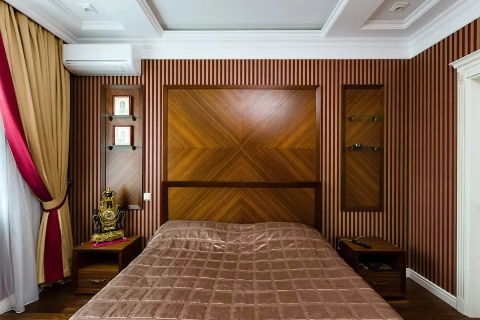 Bedroom with wood wall panels